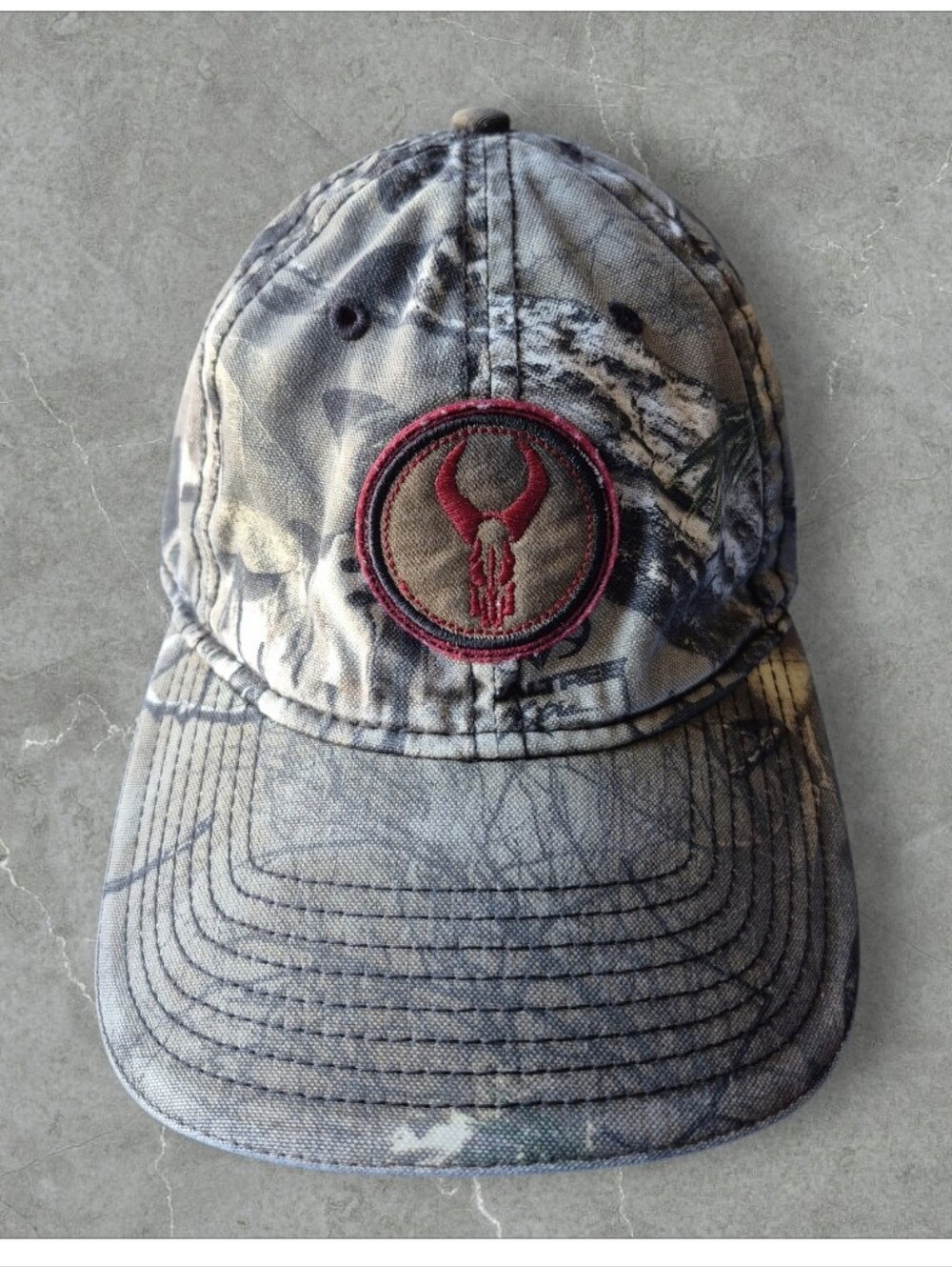 Badlands Men's Camo Baseball Cap with "Red Bull" Patch Accent